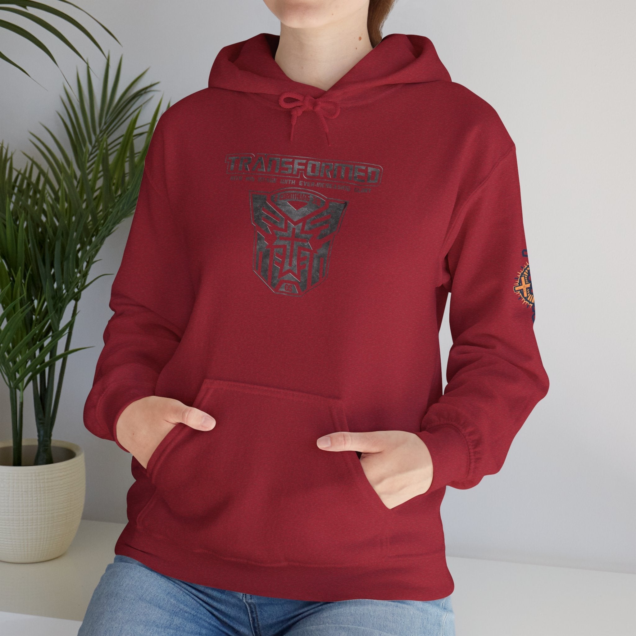 Transformer Logo Christian Hoodie | 2 Corinthians 3:18 Bible Verse Hoodie Printify