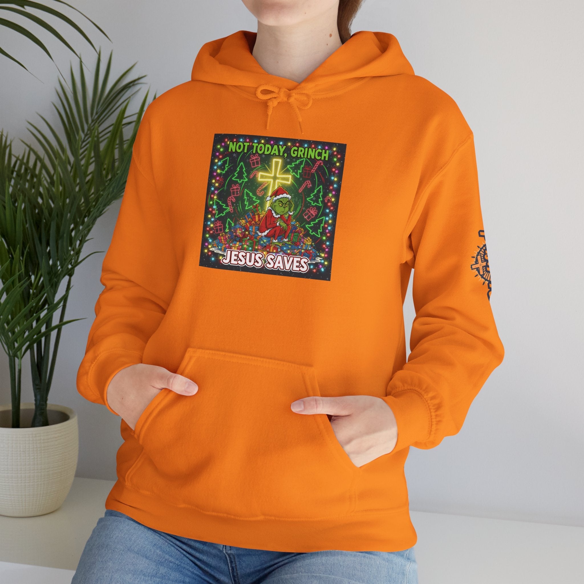 🎄 Not Today, Grinch – Jesus Saves | Funny Christian Christmas Hoodie | Festive Green & Red Cartoon Style | Bold Faith Holiday Tee by Uplifted Gear Printify