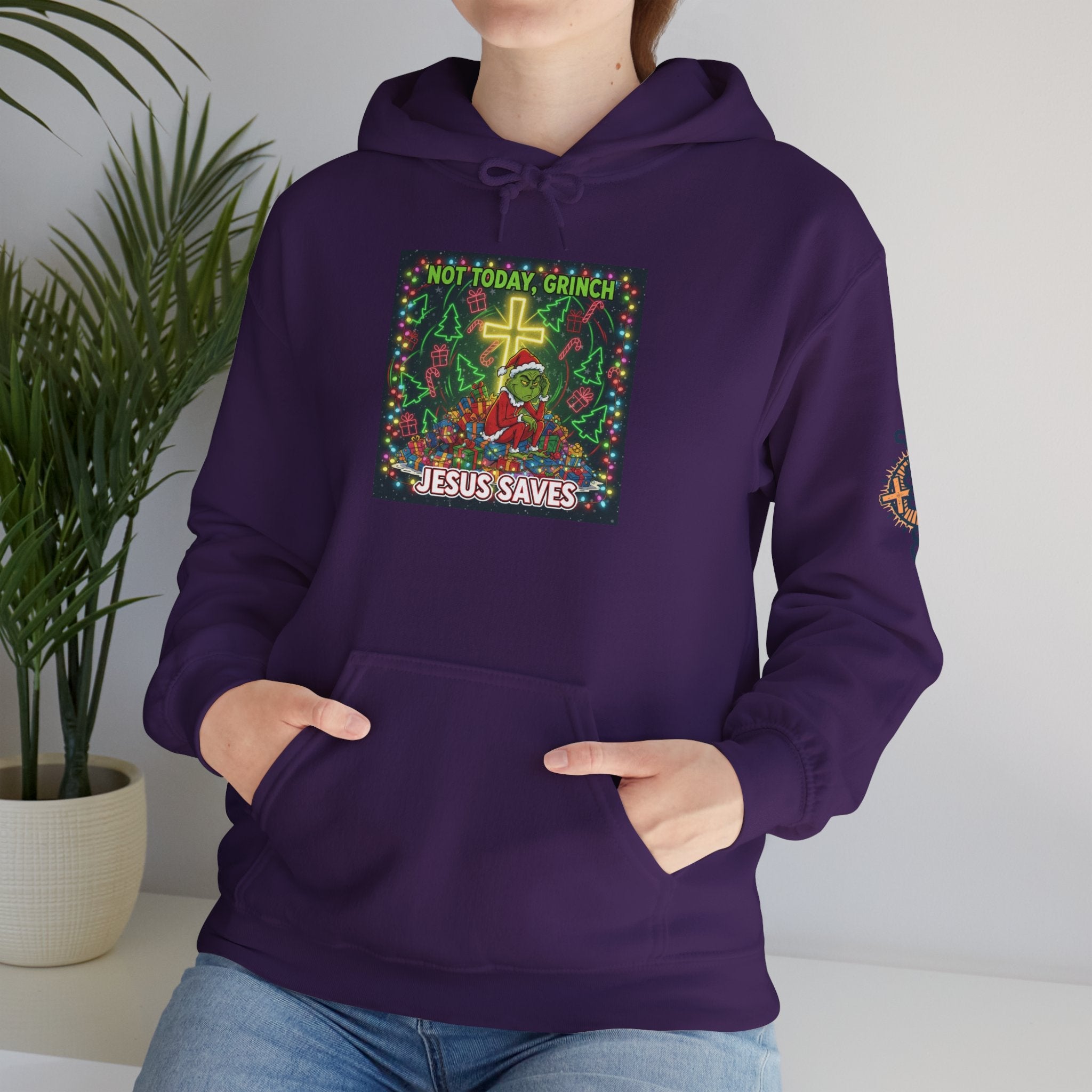 🎄 Not Today, Grinch – Jesus Saves | Funny Christian Christmas Hoodie | Festive Green & Red Cartoon Style | Bold Faith Holiday Tee by Uplifted Gear Printify