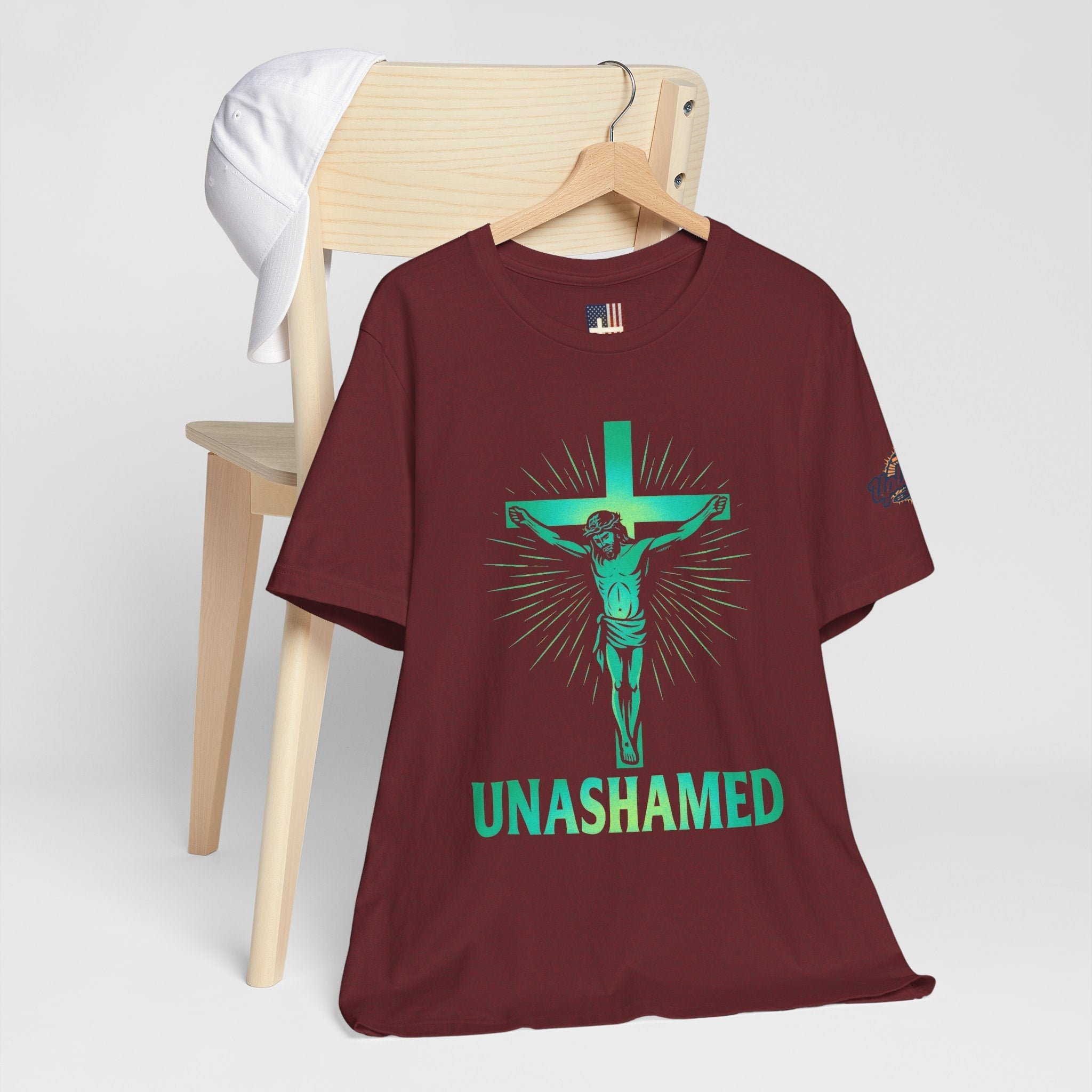 Unashamed T-shirt – Romans 1:16 Crucifixion Christian t-shirt for Bold Unwavering Faith Printify