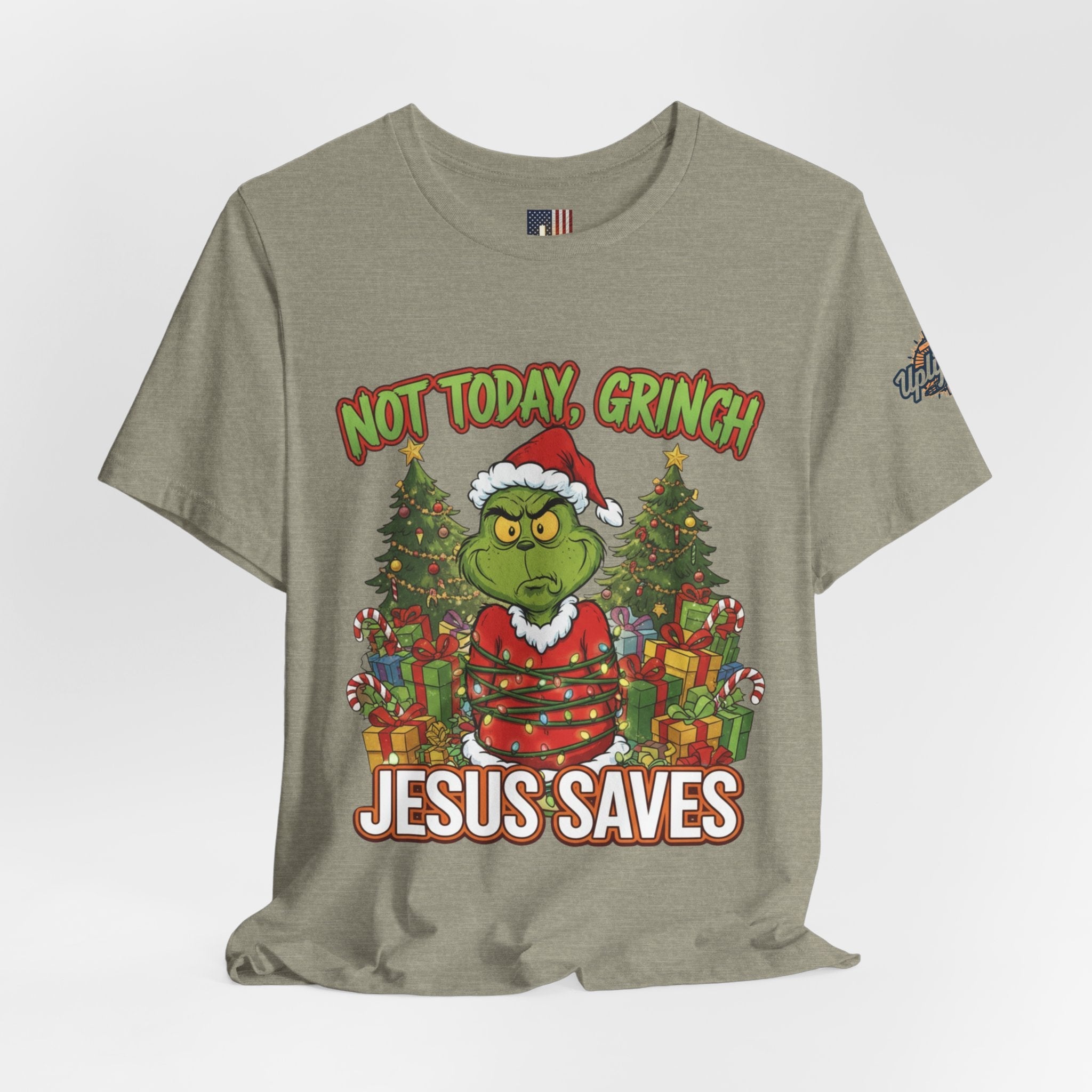 🎄 Not Today, Grinch – Jesus Saves | Funny Christian Christmas T-Shirt | Sulking Grinch & Glowing Cross | Bold Neon Faith Tee by Uplifted Gear Printify