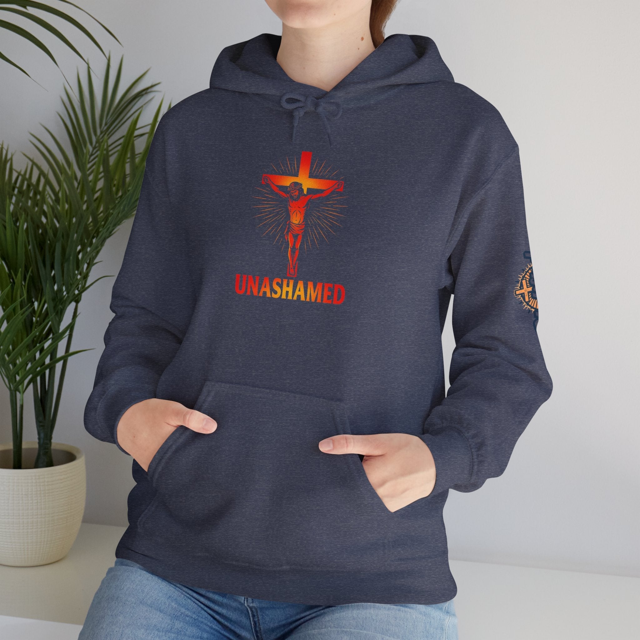 Unashamed Hoodie – Romans 1:16 Crucifixion Christian Sweatshirt for Bold Unwavering Faith Printify