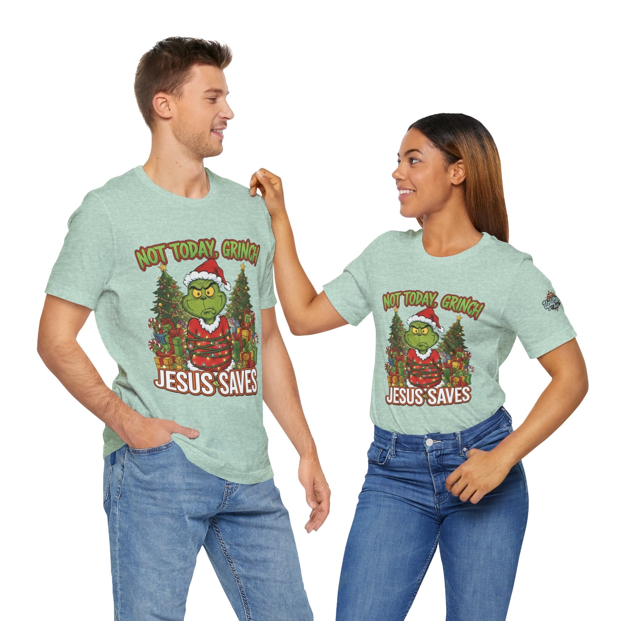 🎄 Not Today, Grinch – Jesus Saves | Funny Christian Christmas T-Shirt | Sulking Grinch & Glowing Cross | Bold Neon Faith Tee by Uplifted Gear Printify
