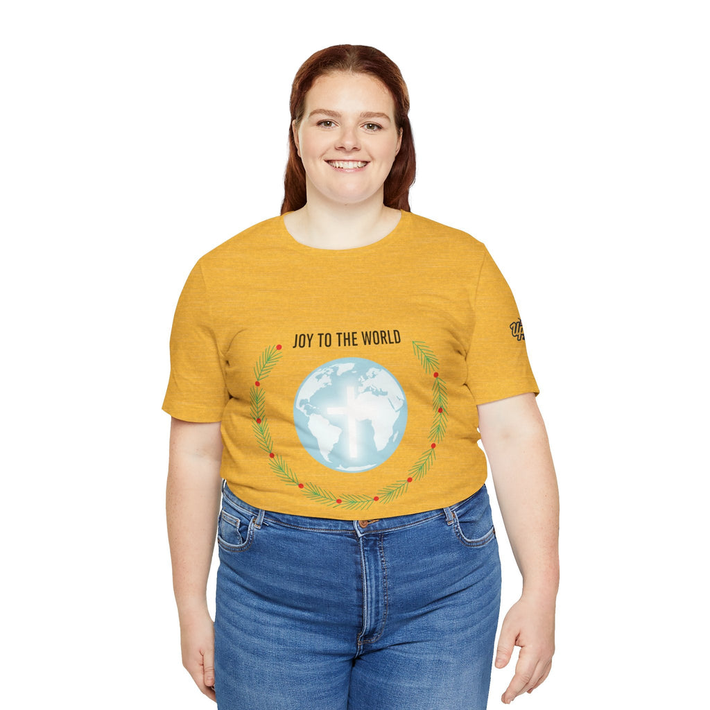 Joy to the World T-shirt – Wreath Earth Nativity Christian Christmas T-shirt for Isaiah 9:6 Holiday Faith & Festive Joy Printify
