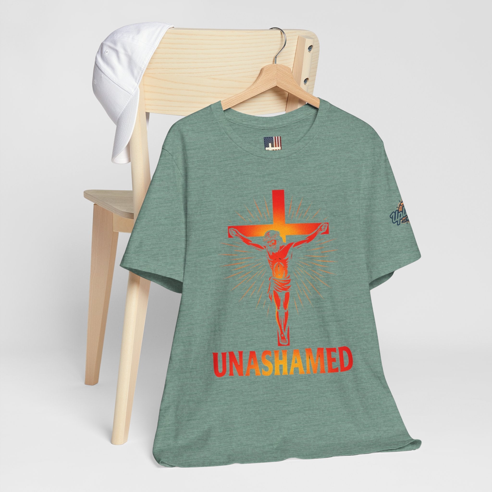 Unashamed T-shirt – Romans 1:16 Crucifixion Christian t-shirt for Bold Unwavering Faith Printify