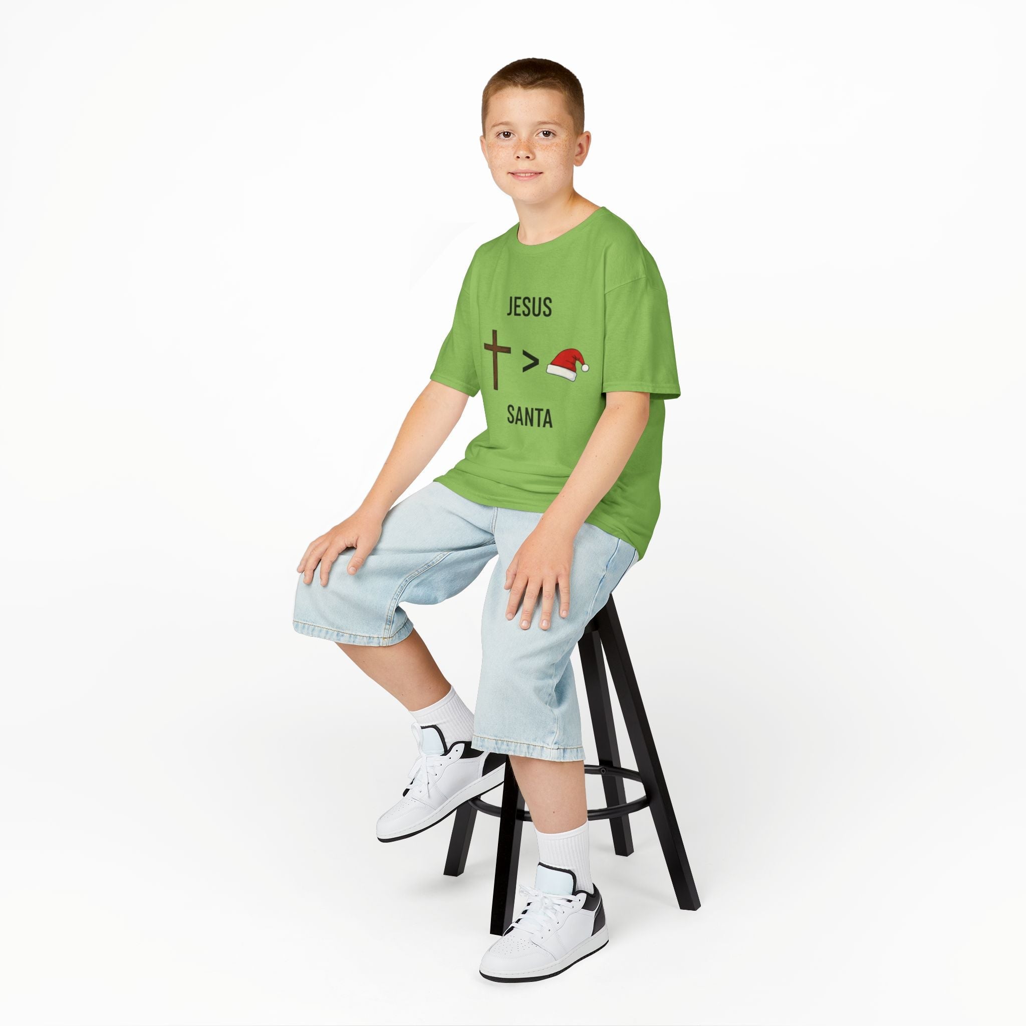 🎄 Jesus > Santa – Minimalist Christian Christmas Kids T-Shirt | Bold Faith Over Holiday Tee | Cross vs Santa Hat Design | Uplifted Gear Printify