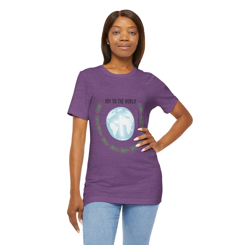 Joy to the World T-shirt – Wreath Earth Nativity Christian Christmas T-shirt for Isaiah 9:6 Holiday Faith & Festive Joy Printify