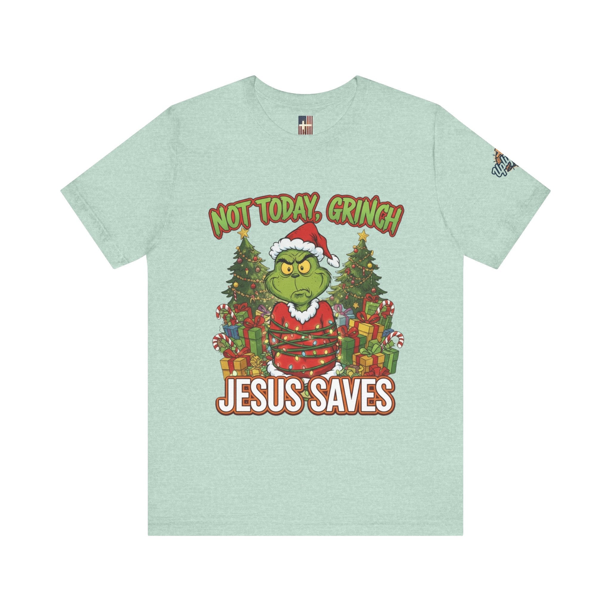 🎄 Not Today, Grinch – Jesus Saves | Funny Christian Christmas T-Shirt | Sulking Grinch & Glowing Cross | Bold Neon Faith Tee by Uplifted Gear Printify