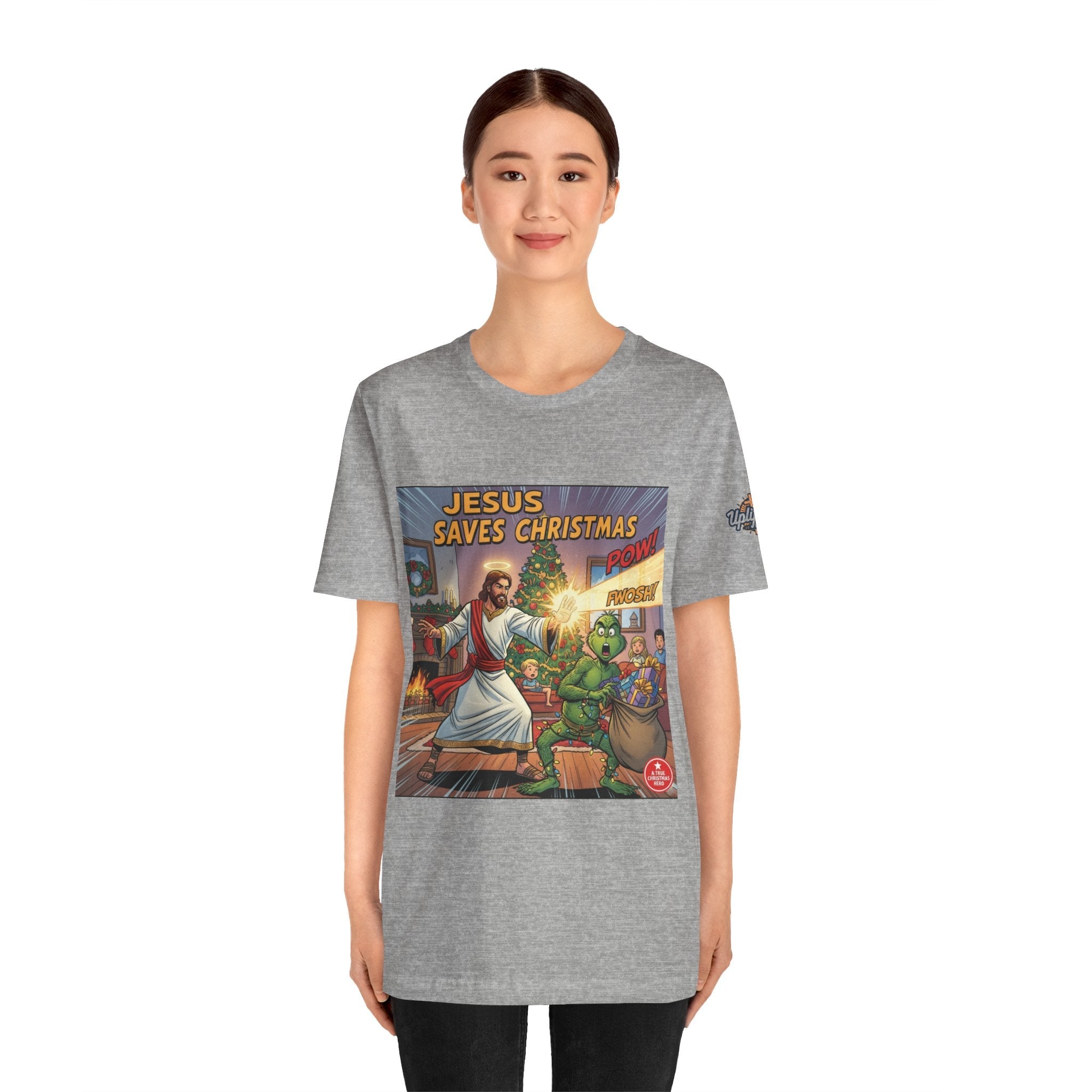 Jesus Saves Christmas T-shirt – Grinch vs Savior Light Battle Christian T-shirt for Hilarious Holiday Faith & True Joy Printify