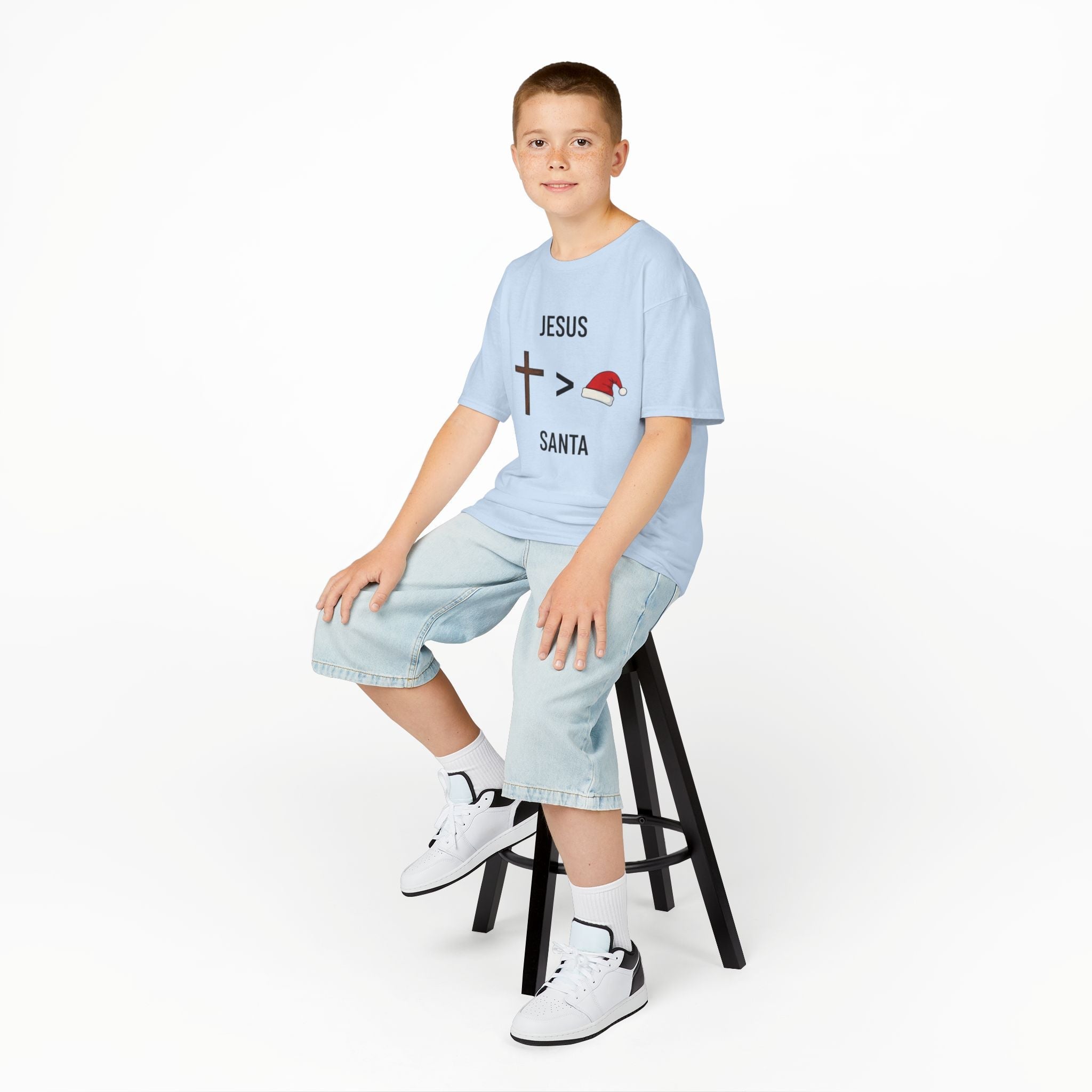 🎄 Jesus > Santa – Minimalist Christian Christmas Kids T-Shirt | Bold Faith Over Holiday Tee | Cross vs Santa Hat Design | Uplifted Gear Printify