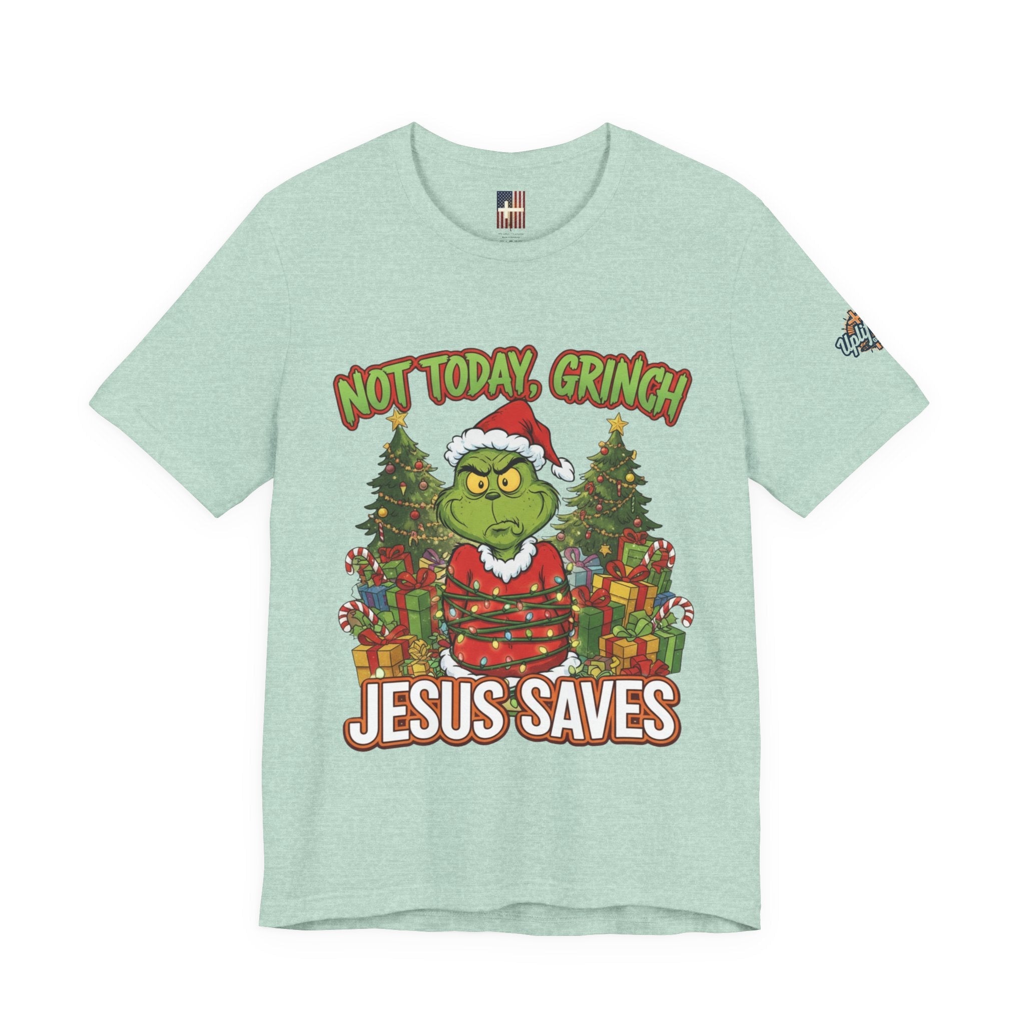 🎄 Not Today, Grinch – Jesus Saves | Funny Christian Christmas T-Shirt | Sulking Grinch & Glowing Cross | Bold Neon Faith Tee by Uplifted Gear Printify