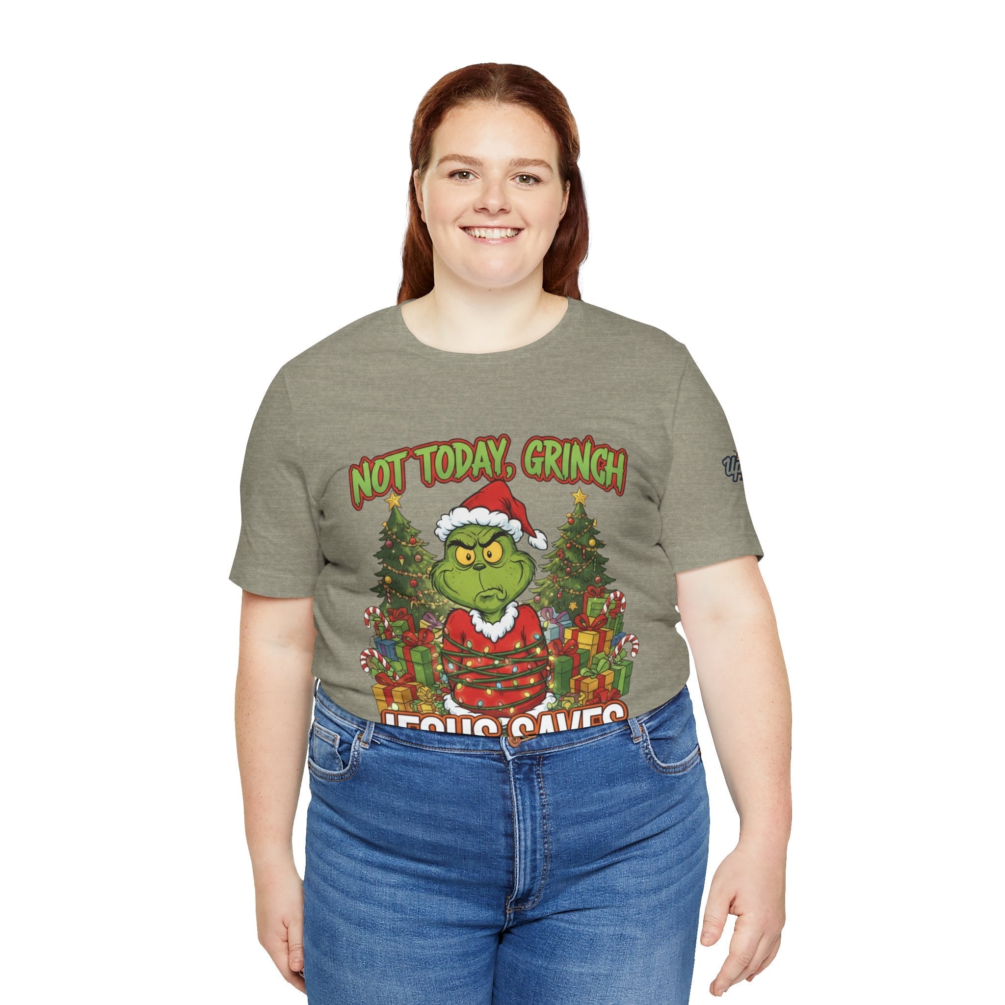 🎄 Not Today, Grinch – Jesus Saves | Funny Christian Christmas T-Shirt | Sulking Grinch & Glowing Cross | Bold Neon Faith Tee by Uplifted Gear Printify