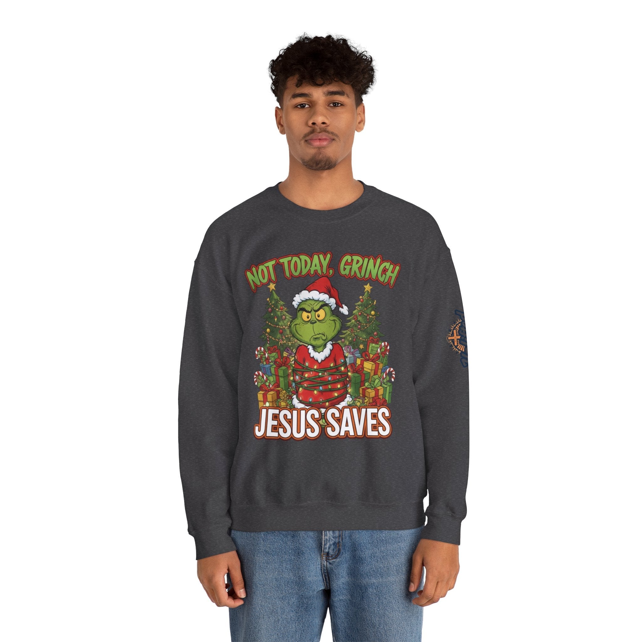 🎄 Not Today, Grinch – Jesus Saves | Funny Christian Christmas Sweatshirt | Sulking Grinch & Glowing Cross | Bold Neon Faith Tee by Uplifted Gear Printify