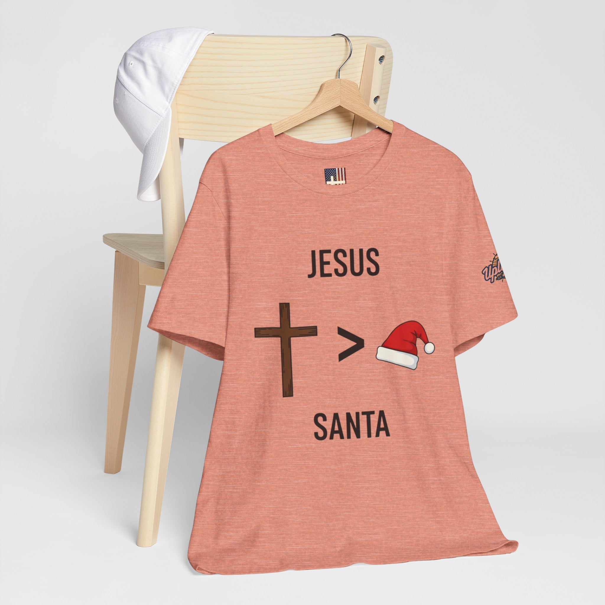 🎄 Jesus > Santa – Minimalist Christian Christmas T-Shirt | Bold Faith Over Holiday Tee | Cross vs Santa Hat Design | Uplifted Gear Printify