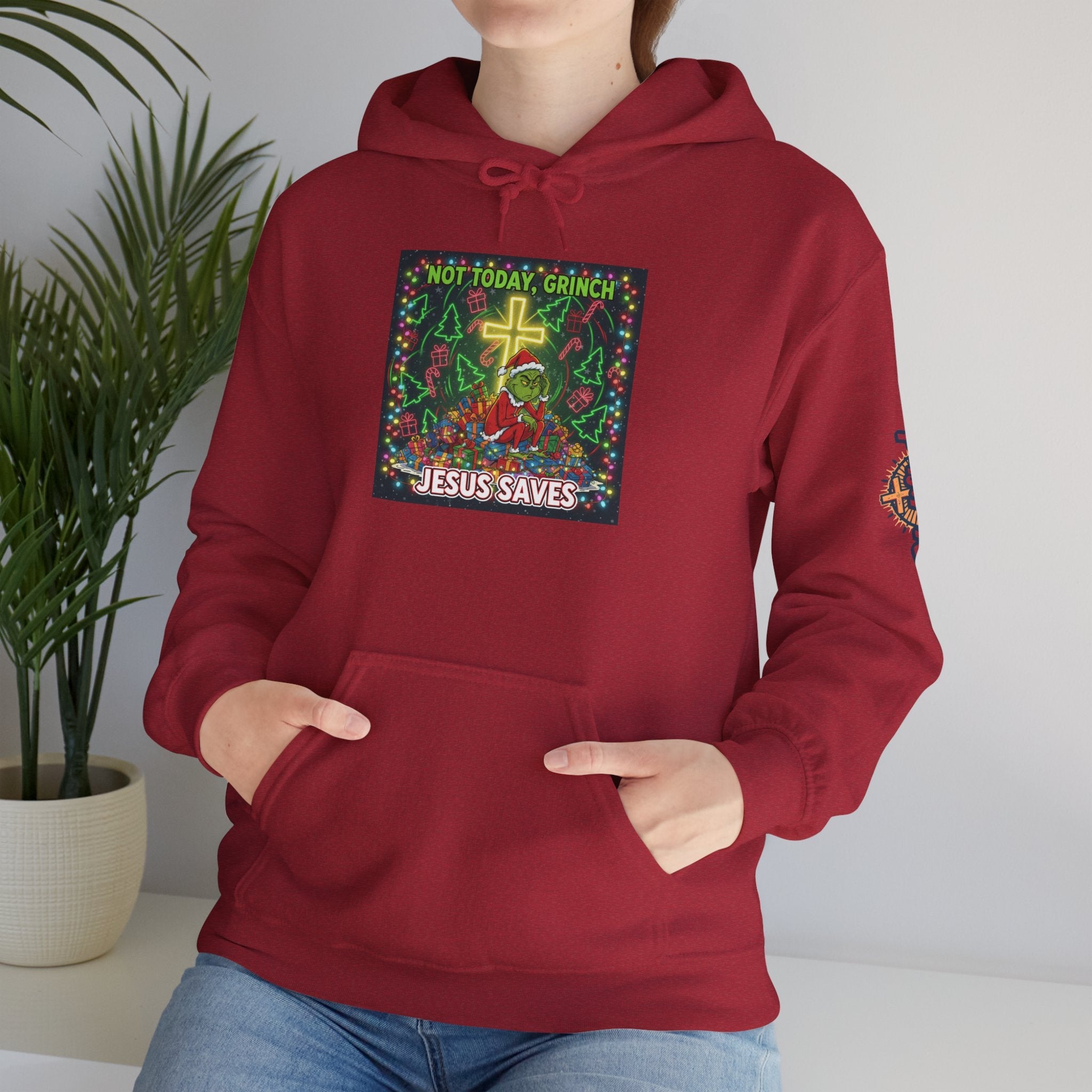 🎄 Not Today, Grinch – Jesus Saves | Funny Christian Christmas Hoodie | Festive Green & Red Cartoon Style | Bold Faith Holiday Tee by Uplifted Gear Printify